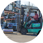 Forklift drivers move parts and raw materials between production areas